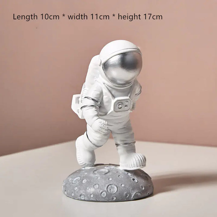 Astronaut phone holder