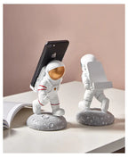 Astronaut phone holder