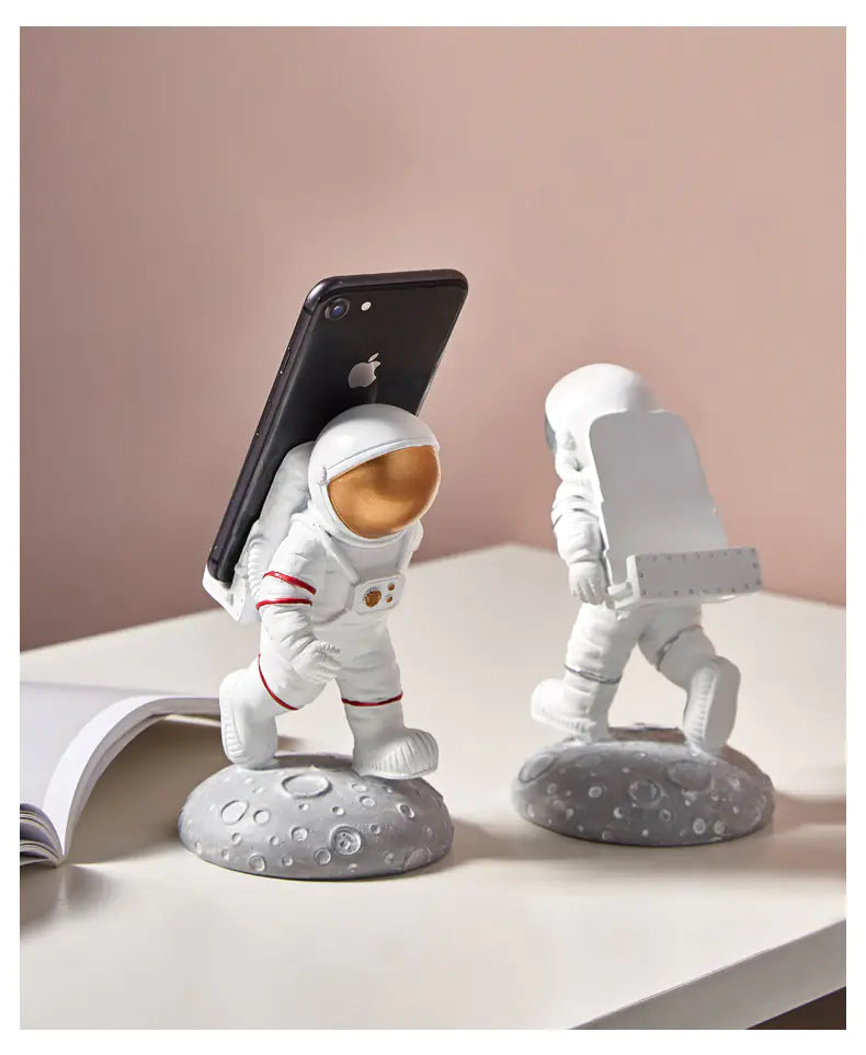 Astronaut phone holder